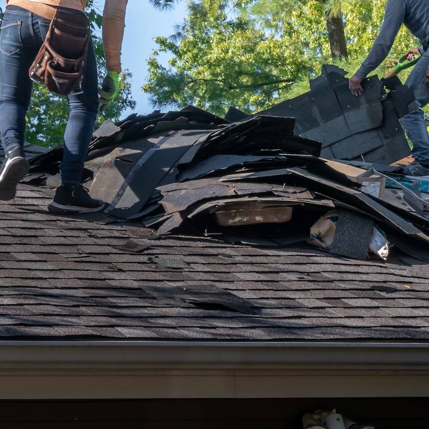 tearing off old roofing